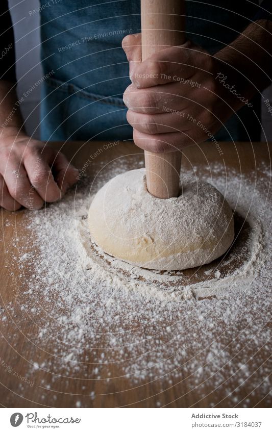 Crop man preparing Rosca de Reyes Cook Dough Flour rosca de reyes Baked goods Tradition Spanish Bakery Table Food Bread Ingredients Preparation chef Man Cooking