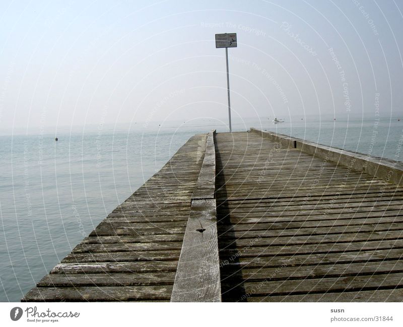 Bridge by the sea Footbridge Beach Loneliness Dark Far-off places Italy Europe bathing prohibited