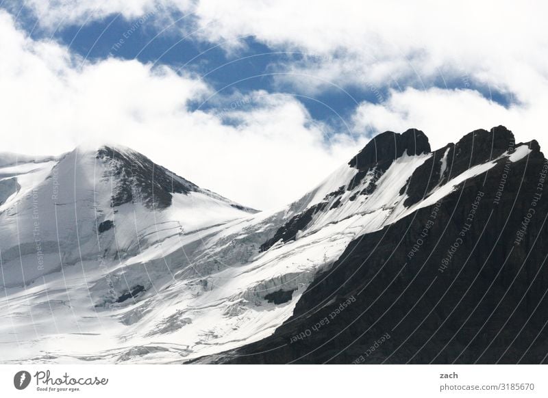 Glacier remnants Landscape Sky Clouds Beautiful weather Snow Rock Mountain Rocky Mountains Peak Snowcapped peak Jasper national park Banff National Park Canada