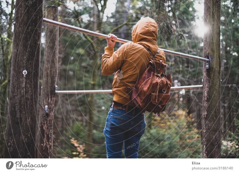 A man who does sports alone outside in the fresh air in the forest Sports Fitness segregated Sports Training Weight training Pull-up Masculine 1 Human being