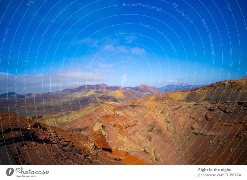 volcanic landscape Nature Landscape Elements Earth Fire Sky Clouds Horizon Summer Beautiful weather Rock Volcano Island Lanzarote Vacation & Travel Fallow land