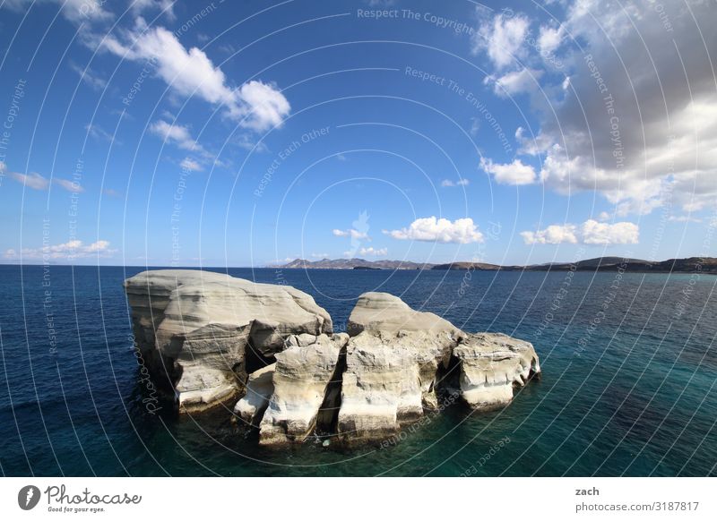 Rock in the surf Landscape Water Sky Clouds Beautiful weather Hill Coast Ocean Mediterranean sea Aegean Sea Island Cyclades Milos Greece Blue Colour photo