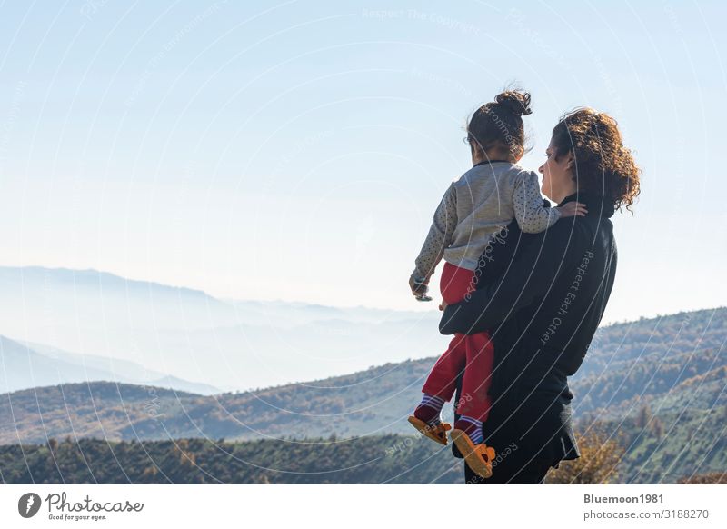 Mother with little daughter looking at mountains on vacation Lifestyle Healthy Relaxation Leisure and hobbies Vacation & Travel Tourism Trip Freedom Mountain