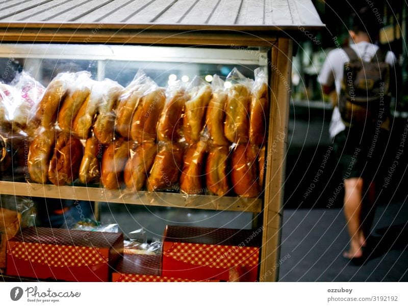 street food hawker at night Food Bread Cake Fast food Lifestyle Shopping Human being Young man Youth (Young adults) Body 1 Small Town Packaging Package