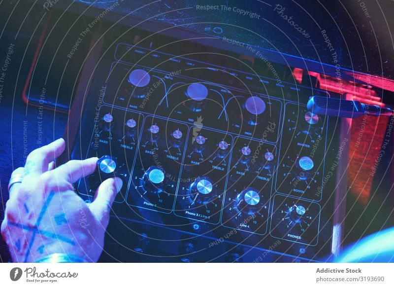 From above an anonymous dj man playing in a club with lights Nightclub Hand Entertainment Record Playing Equipment Turntable Party disc Background picture Club