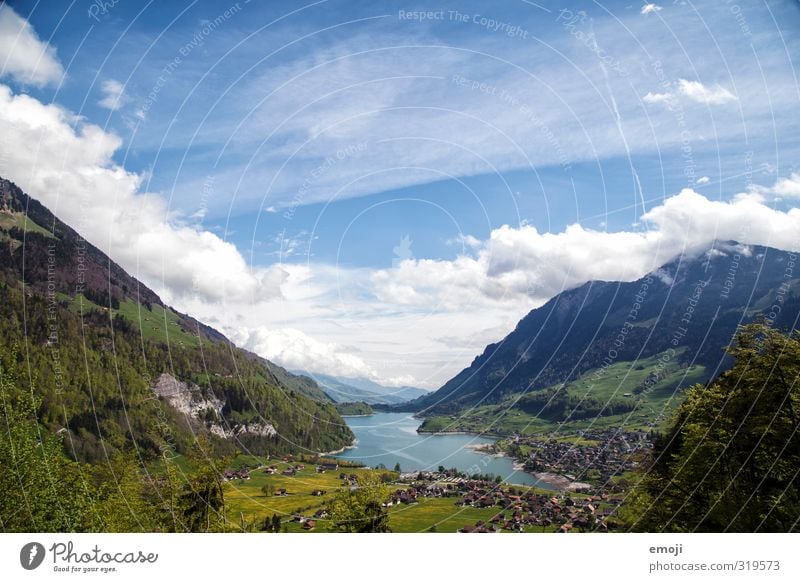 Lungernsee Environment Nature Landscape Sky Spring Summer Beautiful weather Mountain Lake Natural Blue Green Switzerland Tourism Colour photo Exterior shot