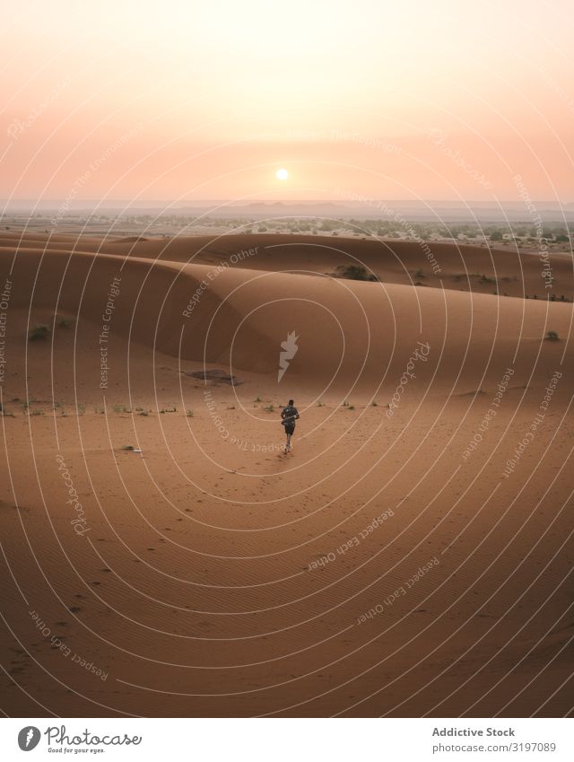 man in summer shirt walking in desert Desert Sunset Sand Morocco Nature Summer Remote Vacation & Travel Peace Freedom Modern Barefoot Vantage point Destination