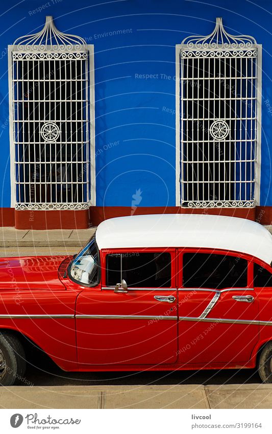 red car parked in front of blue wall , sancti spiritus - cuba Lifestyle Vacation & Travel Tourism Trip Island House (Residential Structure) Decoration Art