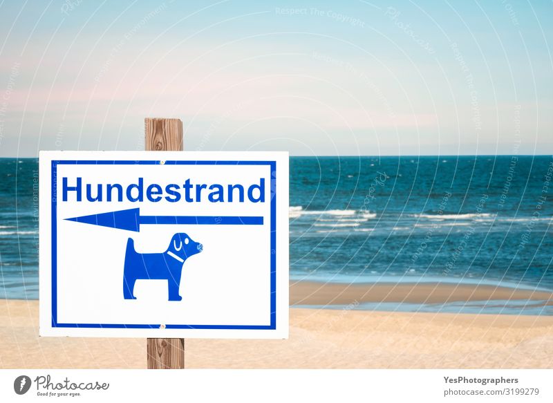 German sign for dog beach on Sylt island. Dog beach day context Relaxation Vacation & Travel Tourism Summer Summer vacation Beach Ocean Island Waves Nature