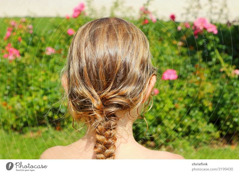 Girl with braided hair in front of Rosenbusch Human being Feminine Child Youth (Young adults) Head Hair and hairstyles 1 8 - 13 years Infancy Braids Angel