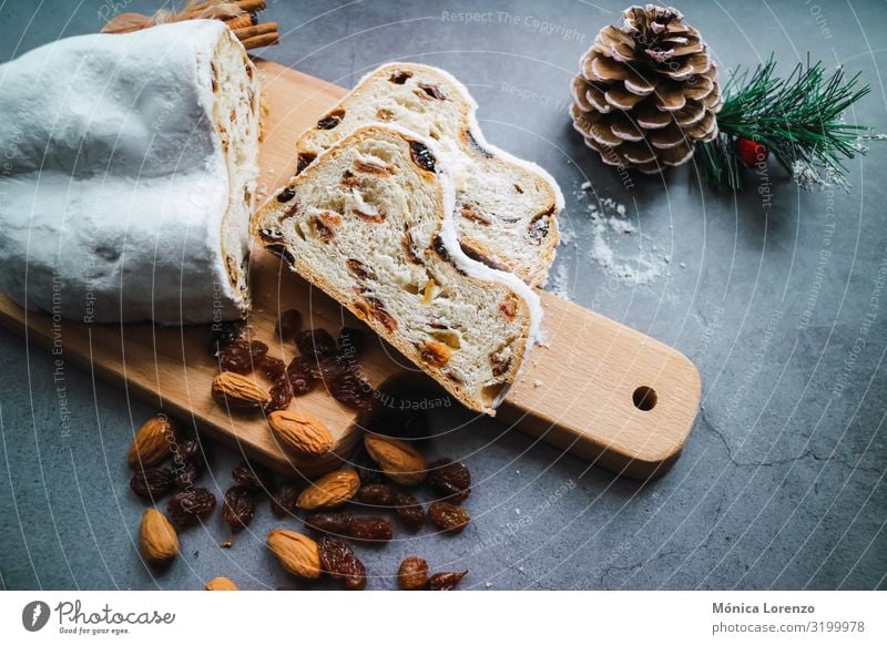 Christmas stollen cake with cinnamon, anise and almonds. Fruit Bread Dessert Herbs and spices Winter Feasts & Celebrations Tradition Sugar ginger Cinnamon sweet