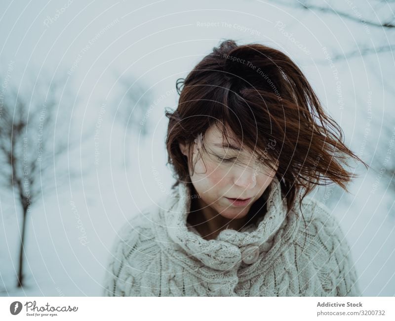 Dreamy woman in sweater against winter landscape Woman Winter Portrait photograph Sweater Landscape Snow Brunette Pensive Model White Area Attractive Seasons