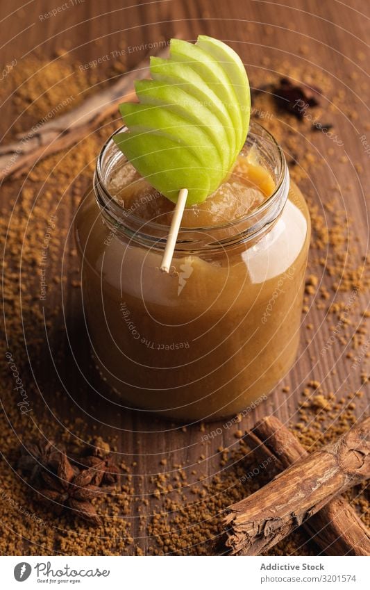 Delicious applesauce in glass jar and cinnamon Natural Juicy Cinnamon Fruit Apple Food Dessert Green Sweet Vegetarian diet Fresh Home-made Decoration yummy Raw