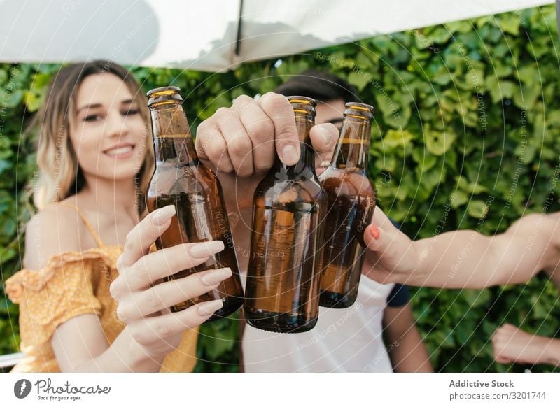 Group of friends drinking beer on the terrace of a bar Alcoholic drinks asian Autumn Bar Beach Beer Feasts & Celebrations Cheerful Toast Drinking Woman