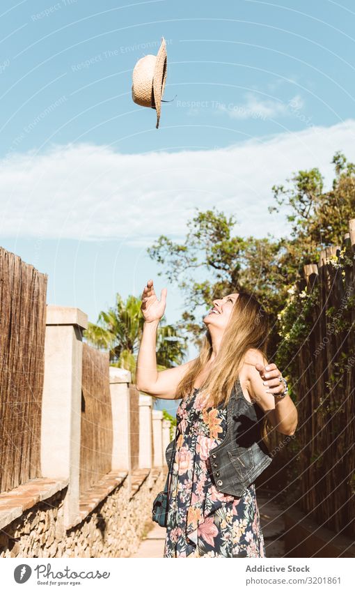 Happy woman throwing hat up Woman Straw hat Summer toss Vacation & Travel Cheerful Style Throw Tourism Emotions Expression Bright Beauty Photography Fly Smiling