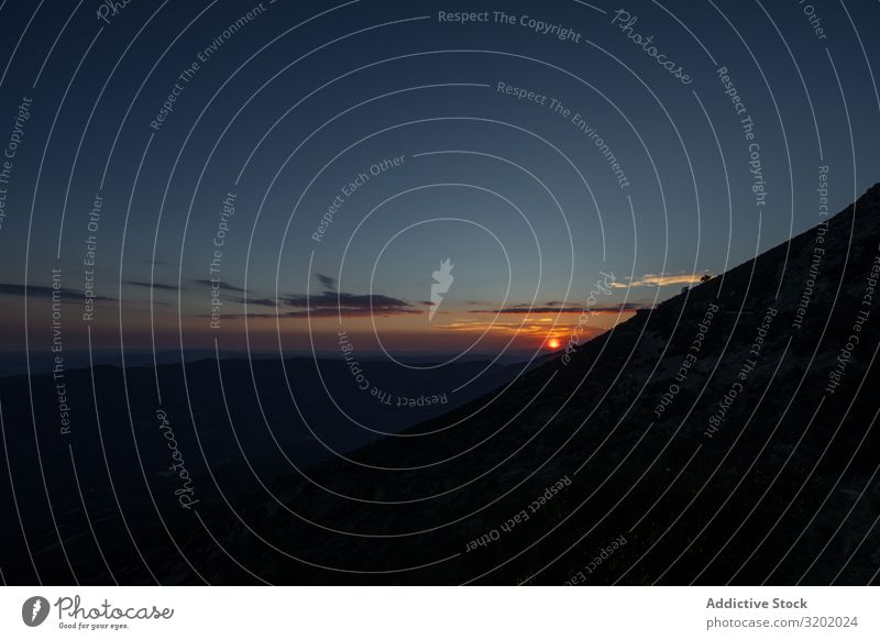 Beautiful bright sunset in mountains Sunset Mountain Dark Landscape Cliff Rock Sky Panorama (Format) Bright Picturesque Peak Top Vantage point Fog stunning