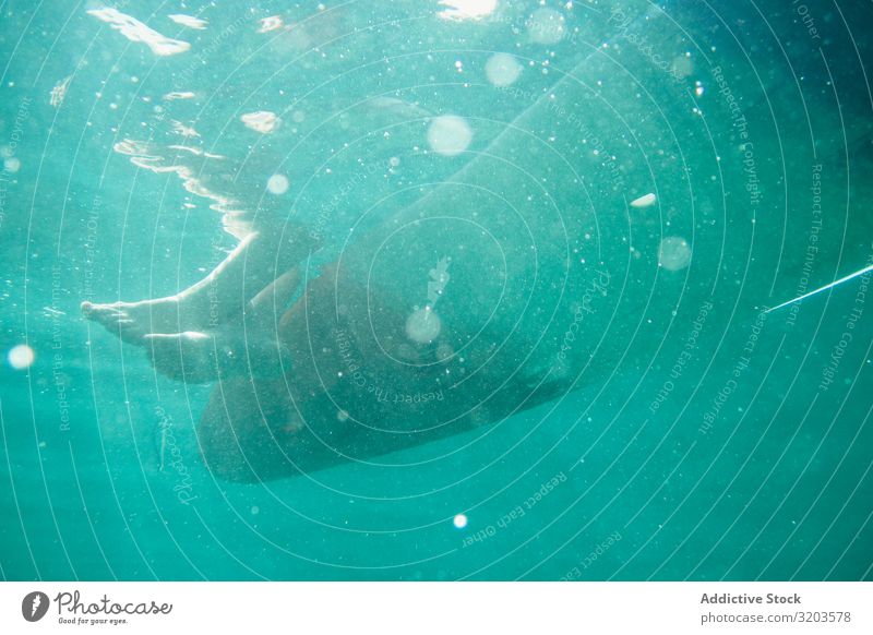 Underwater with person on boat Underwater photo Watercraft Float in the water Turquoise Sunlight Vacation & Travel Fresh Thailand chill Blue Ocean Nature