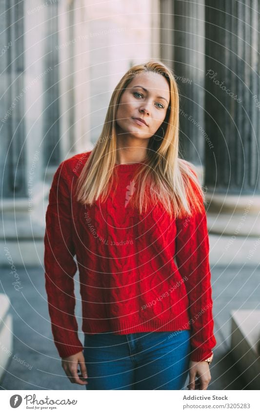 Stylish female standing near marble columns Woman Portrait photograph Looking into the camera Street City Youth (Young adults) Column Style Building Marble