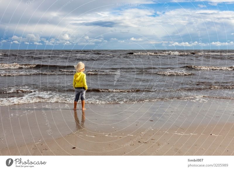 Boy Windy Sea Vacation & Travel Far-off places Beach Waves Child Human being Boy (child) Landscape Clouds Storm Gale Coast Baltic Sea Anticipation Longing