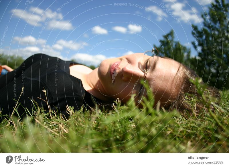 lake park Meadow Woman Black Green Sea park Sleep Clouds Grass Upper body Sky Freiburg im Breisgau Contentment Happy Laughter Blue Face