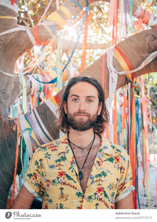 Hipster man walking in the jungle hipster nature swim summer unbuttoned shirt relax smile environment cheerful happy beard holiday trip vacation adventure river