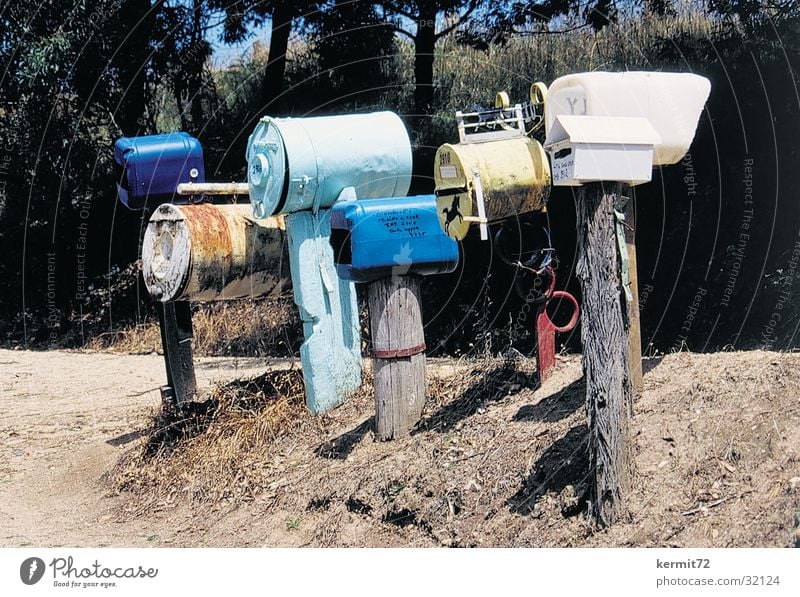 You have mail Mail Mailbox Communicate Australia Wooden stake plastic barrels metal drums snail mail Card postal delivery Rural Loneliness Colour photo