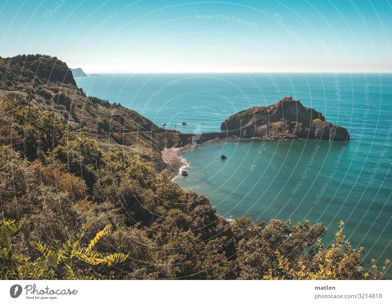 View of Gaztelugatxeko Doniene Nature Landscape Plant Sky Cloudless sky Horizon Summer Beautiful weather Tree Forest Hill Rock Coast Beach Bay Ocean Island