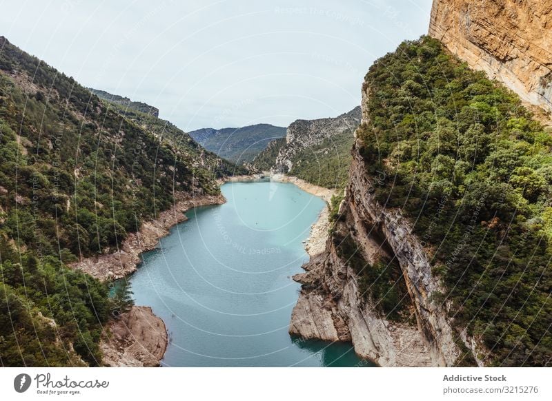 Lake in the middle of high mountains lake blue nature landscape view park natural water sky travel tourism scenic green forest hiking outdoor rock summer