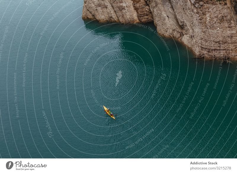 People crossing a river by kayak people water lifestyle sports kayaking travel landscape recreation activity boat summer rowing nature tourism blue boats