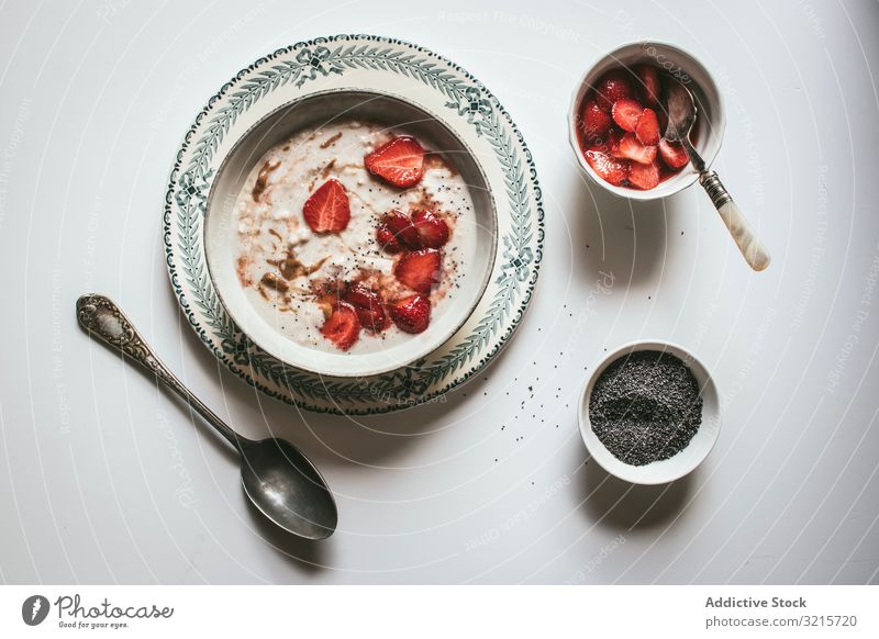 Porridge with strawberries oatmeal strawberry breakfast chia seed food delicious healthy organic eating diet ingredient culinary tasty cooked prepared dish bowl