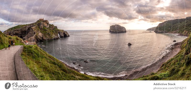 Panoramic view of beautiful bay and cloudy sky panoramic seaside touristic path calm water beach coast landscape nature summer travel vacation tourism coastline