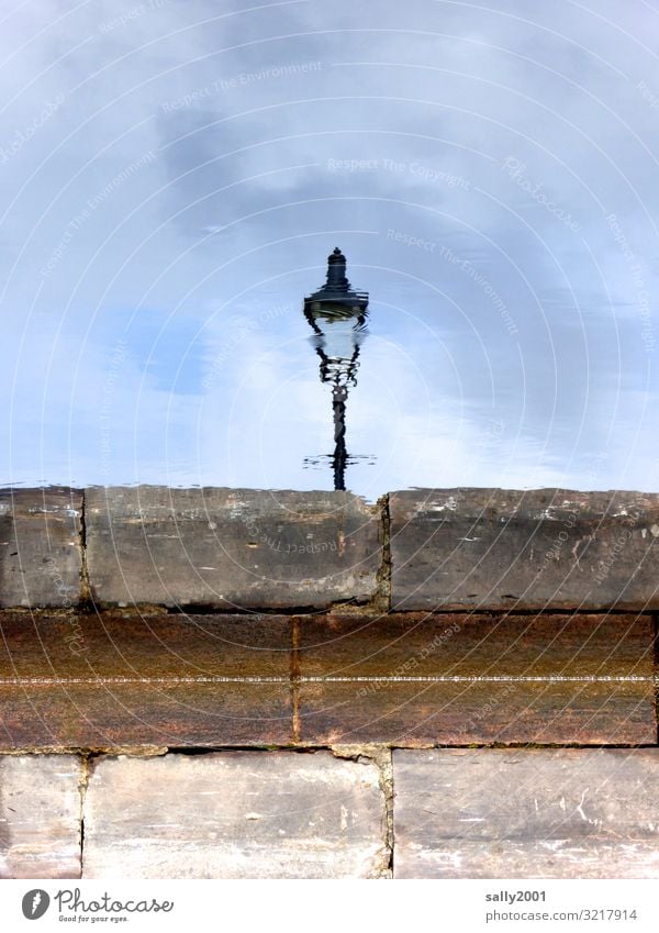 blurry light... Lantern Lamp streetlamp Street lighting Reflection reflection warped blurred hazy Stone bank Symmetry Bank reinforcement Light Water Clouds