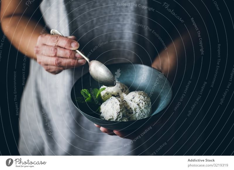 Stracciatella ice cream balls hands woman holding bowl ice-cream stracciatella chocolate mint white gelato sweet food italian product dairy summer home made