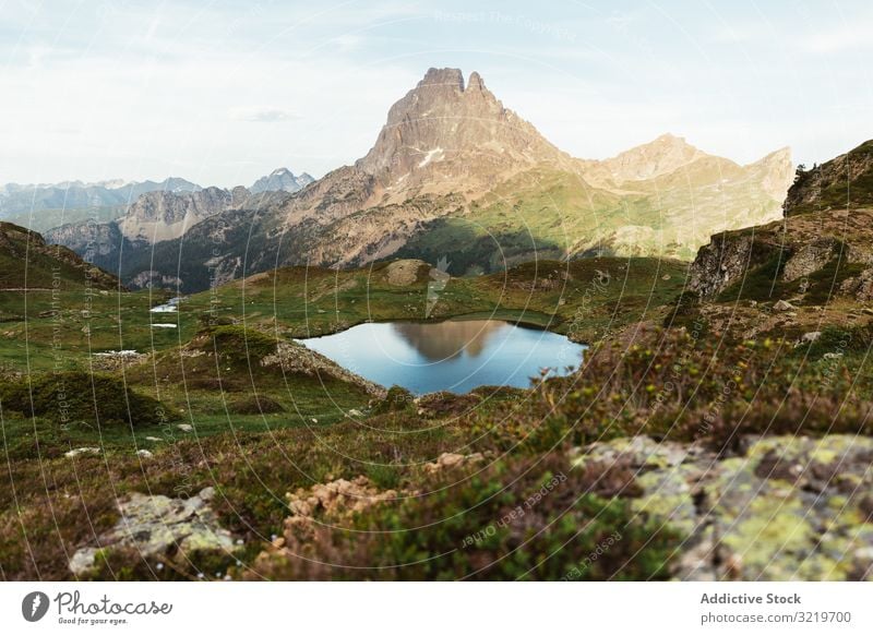 Picturesque view of lake in mountain area pyrenees lawn travel picturesque beautiful calm stony sunny day water landscape summer nature scenic countryside rocky