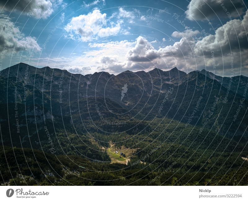 Julian Alps from the mountain Vogel in the Triglav National Park, Slovenia Tourism Trip Expedition Mountain Hiking Sky Clouds Sun Beautiful weather Forest Hill