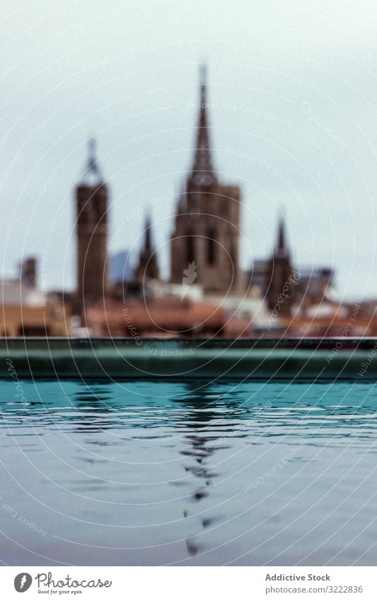 Clear water on background of old church building pool reflection architecture city sky travel view spain barcelona urban landscape tower cathedral tourism