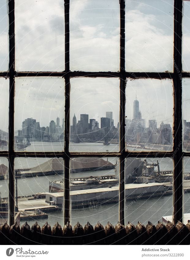 East river and Brooklyn Bridge harbor brooklyn manhattan bridge ship water industrial architecture nyc landmark america through window cityscape usa frame