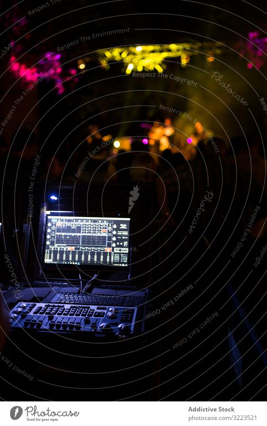 Sound mixer during a night concert man switch buttons volume digital electronic panel equalizer media board technology audio professional control equipment