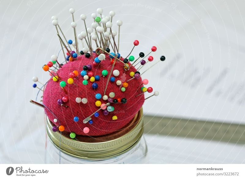 pincushions Needle Pincushion Metal Thin Round Point Red Colour photo Multicoloured Interior shot Close-up Deserted Copy Space right Day Shallow depth of field