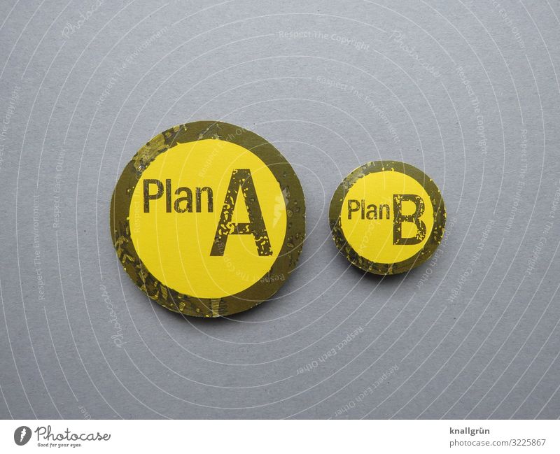 Plan A Plan B Characters Signs and labeling Communicate Yellow Gray Black Flexible Problem solving Fiasco Planning Rescue Safety Alternative Colour photo