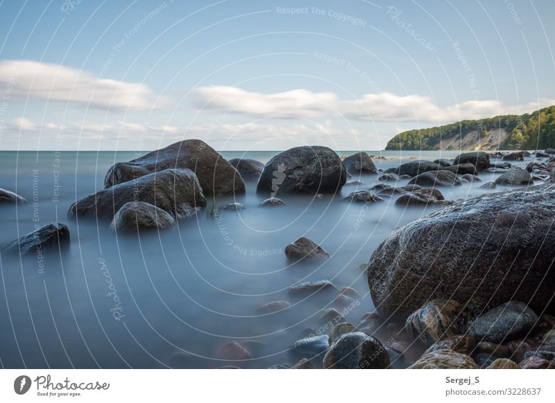 stones Environment Landscape Elements Water Sky Clouds Summer Beautiful weather Coast Baltic Sea Island Rügen Stone Firm Large Blue Pebble beach Colour photo