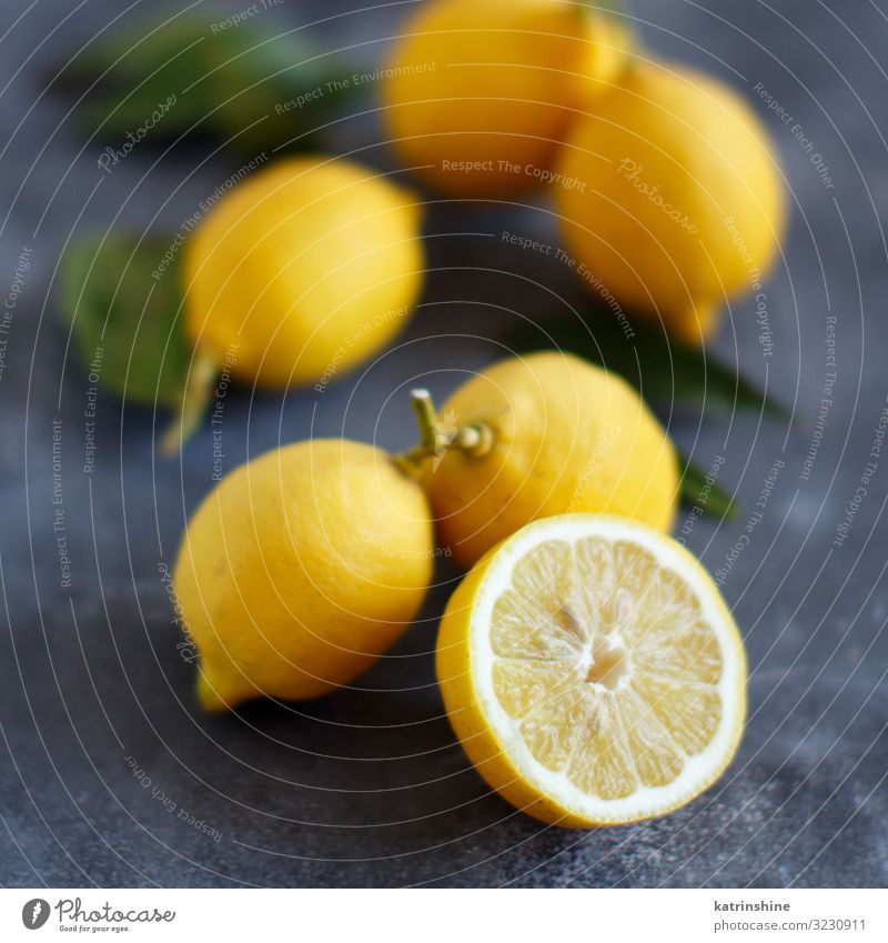 Fresh lemons Fruit Vegetarian diet Exotic Leaf Bright Natural Juicy Yellow Gray Green Lemon Copy Space citrus Tropical food healthy Organic piece Raw Mature