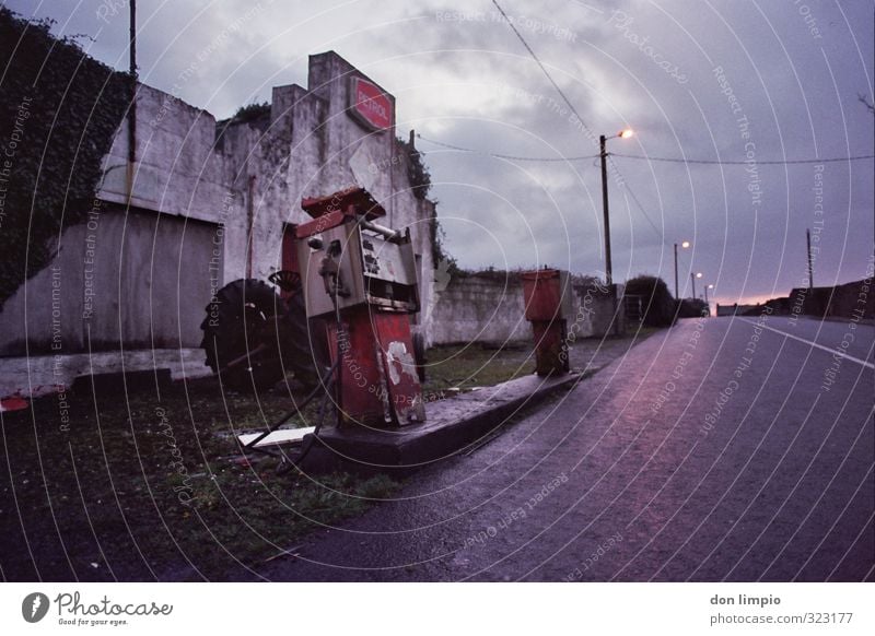 Filling station out of operation for years Petrol station Petrol pump Old Exterior shot Oil Transport Copy Space top Deserted Raw materials and fuels Gasoline