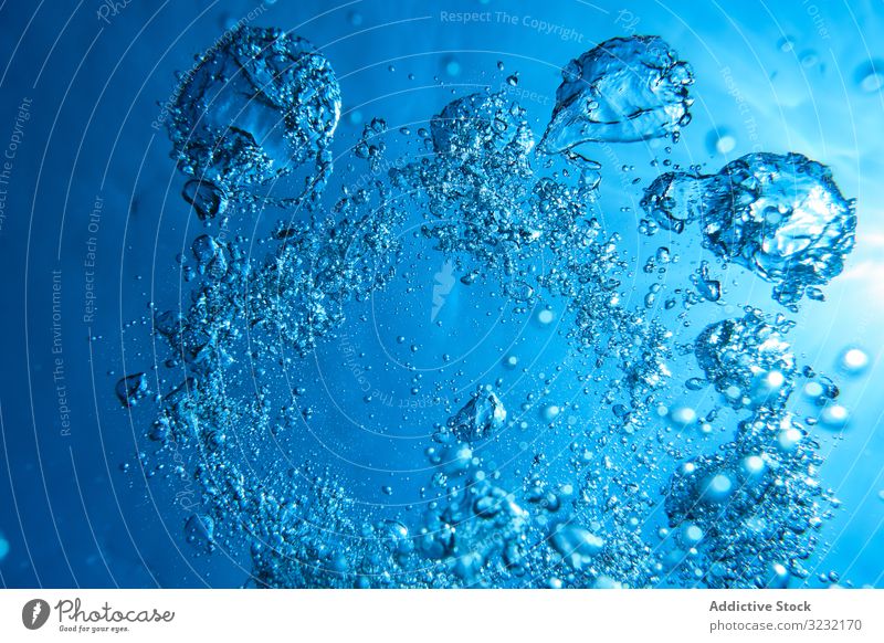 Popping up air bubbles in sea water background clear underwater clean oxygen purity breathe smooth motion fresh surface ocean transparent drop submerged dive