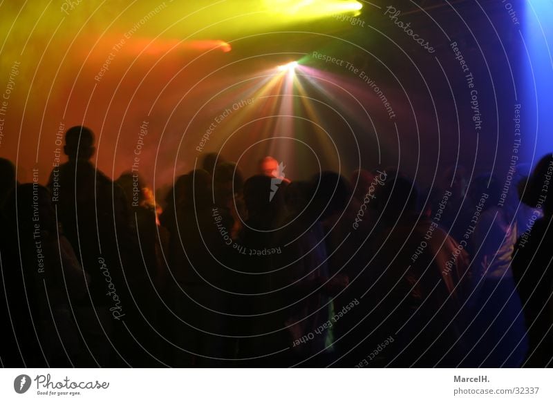 Partytime multi colour Disco Black Light Fog Human being Red Green Yellow disco evening Blue Reaction Contrast Joy Dark Beam of light Lighting effect Flare