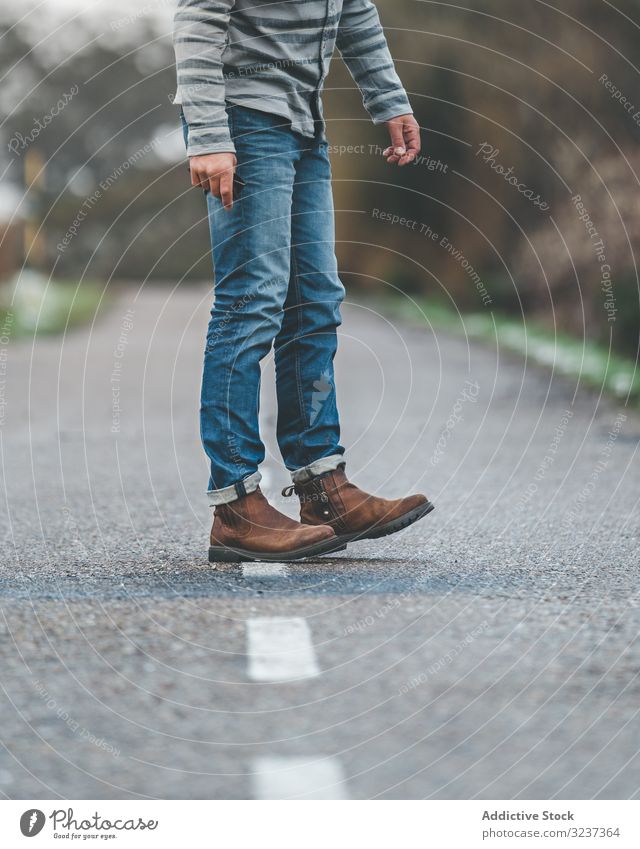 Man walking on country road man cloudy gloomy snow hill forest male foggy adult alone tree frozen cold nature relaxation journey activity season recreation