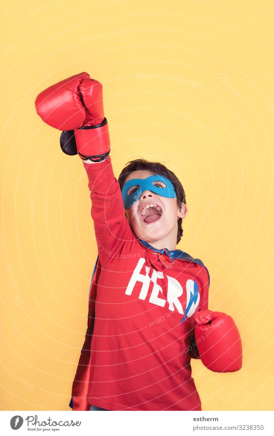 superhero, Portrait of boy in superhero costume on yellow background Lifestyle Joy Happy Playing Adventure Feasts & Celebrations Carnival Birthday Success