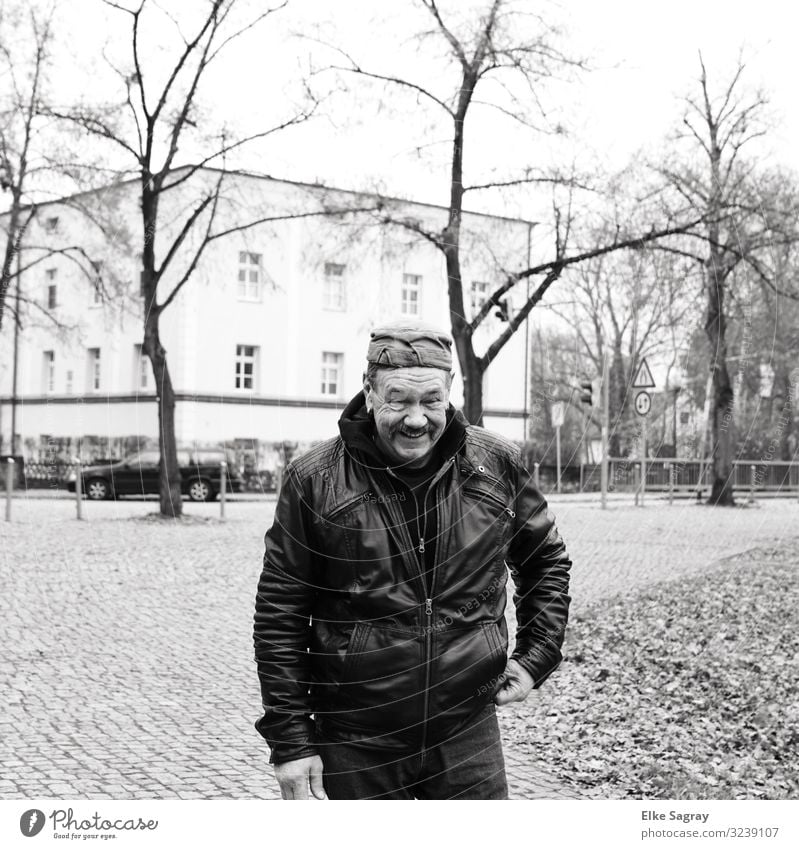 Man amused Human being Masculine Male senior 1 60 years and older Senior citizen Movement Walking Happiness Joy Addiction Black & white photo Exterior shot