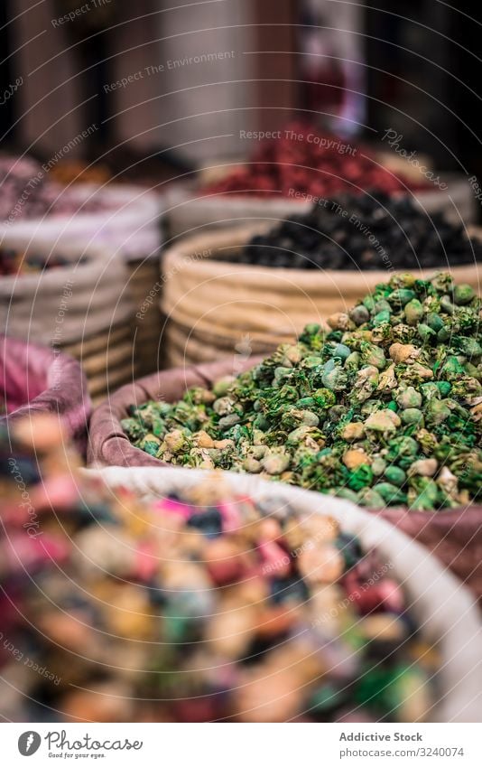 Baskets with dried spices on marketplace basket wicker herb sell traditional aroma marrakesh morocco bazaar arabic city town dry assortment powder trade street