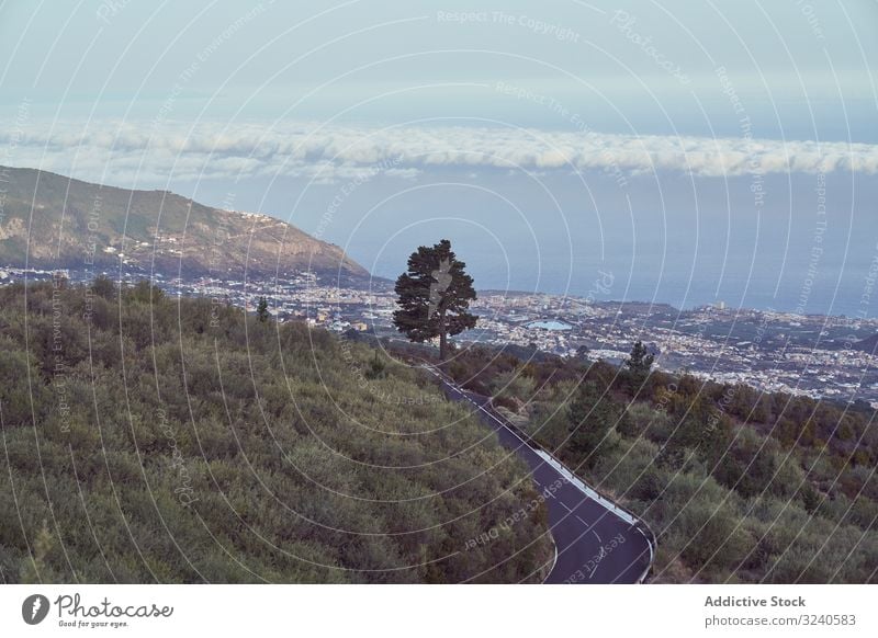 Aerial view of city in mountains sky volcano town island terrain landscape scenic cityscape tenerife el teide spain skyline nature tourism blue destination